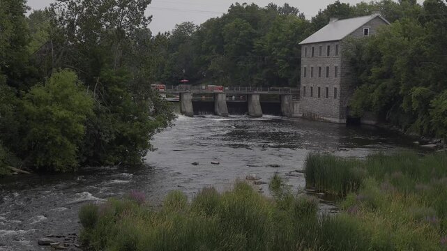 A flower mill on a river