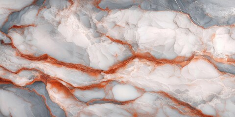 close-up of a marble surface with white, gray, and orange veining creating an abstract natural pattern