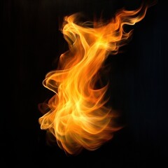 Fototapeta premium Bright swirling orange and yellow flames against a dark background creating dynamic shapes and flowing movement