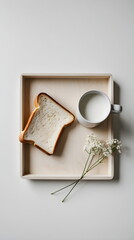 Minimalist still life of bread, milk, and gypsophila flowers on a white background, generative ai