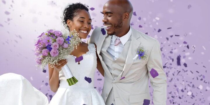 happy young couple - heterosexual man and woman of african american decent - bride and groom at wedding