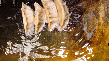 Dumplings in oil. Deep-fried in oil.