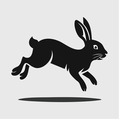 Fototapeta premium minimalist jumping rabbit silhouette vector in black fill with clean closed path for animal decor and crafts