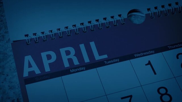 Calendar Pages Turn In The Dark Looping Shot
