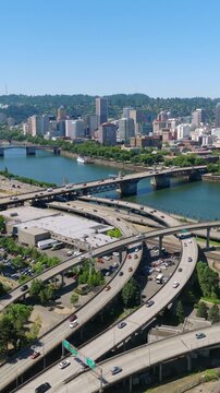 Portland Oregon - Vertical Aerial Approach of Downtown Skyline over Highway During Day