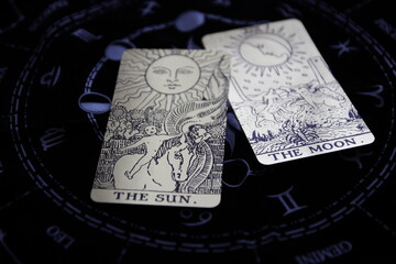 Mystical atmosphere captured through a detailed tarot card arrangement on a textured surface. Rich symbolism and traditional esoteric themes evoke intuition, divination, and spiritual insight. Ideal f