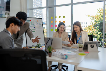 entrepreneurs discuss together to brainstorm and solve problems in various departments of the company, marketing, finance, and accounting are having a meeting in a conference room
