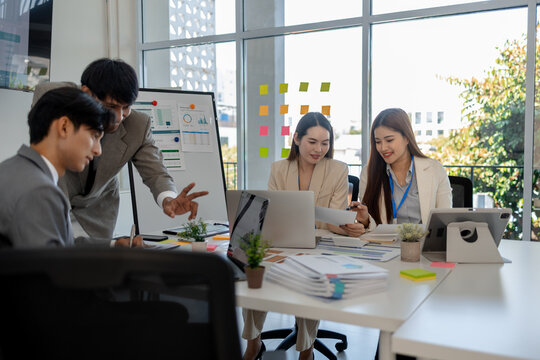 entrepreneurs discuss together to brainstorm and solve problems in various departments of the company, marketing, finance, and accounting are having a meeting in a conference room