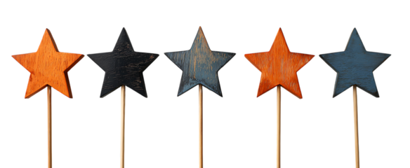 A row of wooden stars in blue, orange, and dark gray colors. They have been hung up by their tops at equal distances apart using long, thin bamboo sticks as stands.