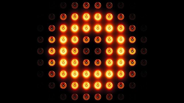 Seamless Loop of Bright Golden Stage Lights Flashing in a Rhythmic Pattern