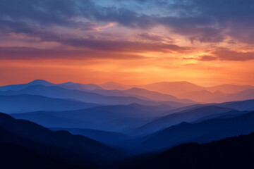 Layers of Mountains in a Colorful Sunrise Mist