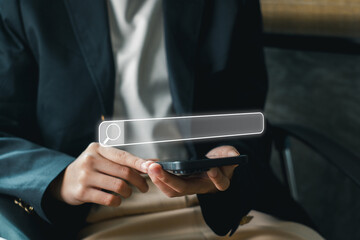 A business professional using a smartphone to explore SEO strategies and digital marketing in a...