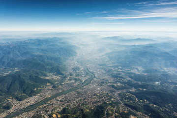 Fototapeta premium stunning aerial photograph essence of nature and urban landscapes from above showcasing dramatic mountain ranges