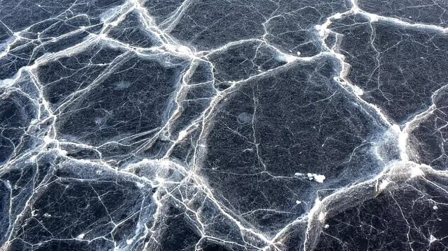 Texture of stone with an abstract blue background showcasing flowing water and dynamic energy patterns, creating a liquid motion design High quality natural video footage 4k cenamatic video short