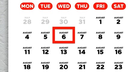 Close-up of the date August 6th marked with a red cursor on the wall calendar 2025