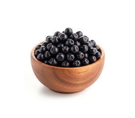Chokeberry in wooden bowl isolated on white background.