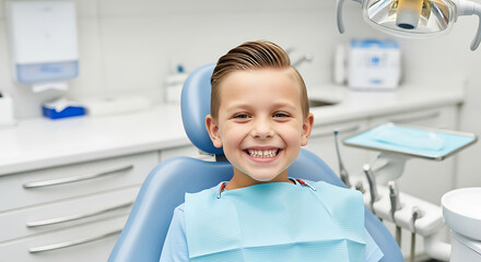 Cheerful young boy smiling happily in a dental chair during a checkup