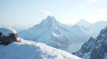 Naklejka premium A majestic view of snow-covered mountain peaks under a clear blue sky. A stunning winter landscape representing adventure, climbing, and the power of nature.
