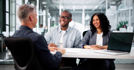 Excited Hispanic Couple Consult Trusted Realtor