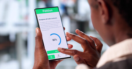 Woman Holding Smartphone Signs Online Petition Form