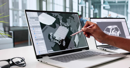 Young Woman Using CAD Software To Render Car Design