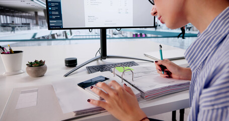 Accountant Crunches Numbers And Creates Tax Invoices