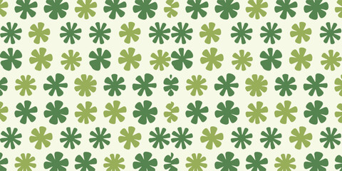 A seamless pattern of green flowers on a light background