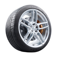 Obraz premium A detailed view of a modern silver alloy car wheel with a tire isolated on transparent background