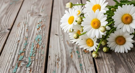 A bouquet of daisies on a wooden surface with peeling paint © Wool World