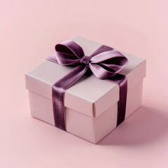 Fototapeta premium Elegant gift box with a luxurious velvet ribbon, perfect for special occasions and celebrations, presented on a soft background, ideal for conveying thoughtfulness and care.