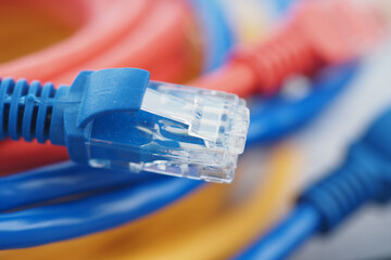 Colorful network cables arranged on a surface