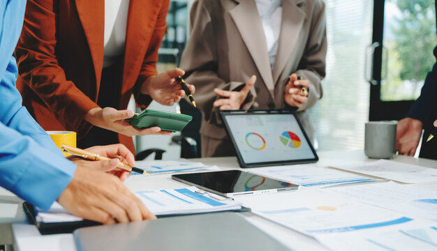 Business team meeting. professional investor working new start up project. Finance task. with smart phone and laptop