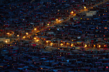 Seda in Tibet reveals a vibrant monastic town illuminated at night in the heart of Tibetan Buddhism