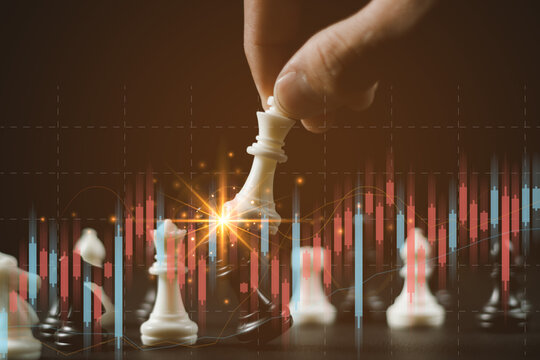 Chess game on chess board on stock market or forex trading graph chart for financial investment concept. Economy trends for digital business marketing strategy analysis. Abstract finance background.