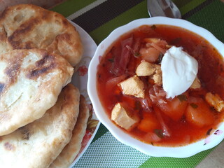 Ukrainian dish red borscht and homemade pies