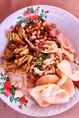 Traditional Indonesian Chicken Porridge with Toppings
