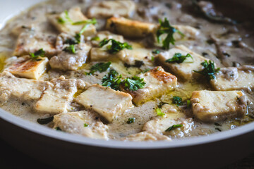 North Indian-style safed paneer – creamy white paneer curry in cashew and milk-based gravy, traditional Indian vegetarian dish, rich mild curry, royal-style shahi paneer variant, top view
