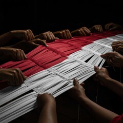 Weaving the Indonesian Flag: A Collaborative Effort of Hands Creating the National Symbol