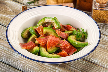 Salad with avocado and salmon