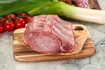 Raw pork loin cut with bone