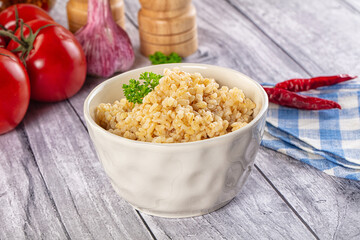 Vegan cuisine - boiled bulgur garnish