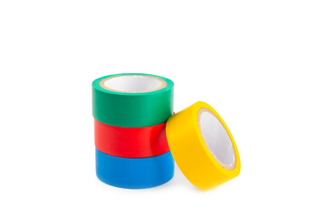 Insulating tape on a bright colored background. Set of different colors insulating tape. Reel...