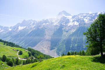 Obraz premium Scenic view of mountain panorama at Lötschental Valley in the Swiss Alps with rockfall on a sunny late spring day. Photo taken June 19th, 2025, Lötschental, Switzerland.