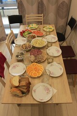 Table with food on holiday. Russia.