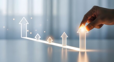 Hand guiding growth arrow upward, symbolizing progress and aspiration for success, achievement, and upward trajectory in business and personal development.