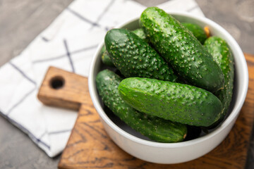 Cucumber on wooden background. Slice of cucumber on background. Fresh organic green cucumbers...