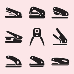 Collection of Black Office Punches and Staplers
