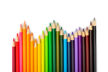 Colored pencils isolated on white background. Equipment for coloring. Stationery for creativity.Back to school. Flatlay. Children's Creativity and Education. Rainbow.