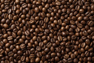 Fototapeta premium Full frame roasted coffee beans for coffee shop branding, gourmet packaging, and cafe menu visuals