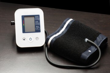 Digital blood pressure monitor on table